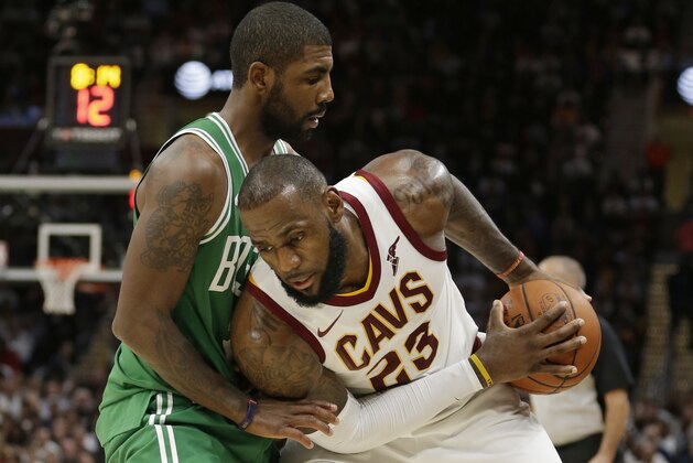 Cleveland Cavaliers' LeBron James, right, tries to get past Boston Celtics' Kyrie Irving in the second half of an NBA basketball game, Tuesday, Oct. 17, 2017, in Cleveland. The Cavaliers won 102-99. (AP Photo/Tony Dejak) Cleveland Cavaliers' LeBron James, right, tries to get past Boston Celtics' Kyrie Irving in the second half of an NBA basketball game, Tuesday, Oct. 17, 2017, in Cleveland. The Cavaliers won 102-99. (AP Photo/Tony Dejak)