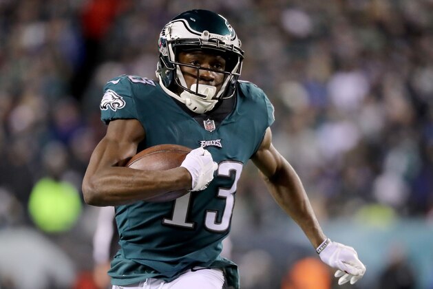 PHILADELPHIA, PA - JANUARY 13: Nelson Agholor #13 of the Philadelphia Eagles runs with the ball in the second half against the Atlanta Falcons during the NFC Divisional Playoff game game at Lincoln Financial Field on January 13, 2018 in Philadelphia, Pennsylvania.  (Photo by Abbie Parr/Getty Images)
