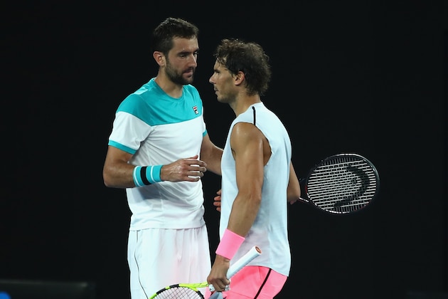 MELBOURNE, AUSTRALIA - JANUARY 23:  Rafael Nadal of Spain shakes hands after retiring injured during the fifth set in his quarter-final match against Marin Cilic of Croatia on day nine of the 2018 Australian Open at Melbourne Park on January 23, 2018 in Melbourne, Australia.  (Photo by Clive Brunskill/Getty Images)