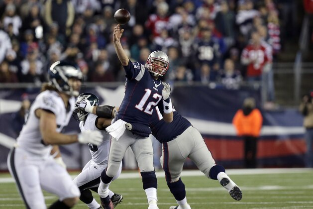 New England Patriots quarterback Tom Brady (12) passes against the Philadelphia Eagles during the first half of an NFL football game, Sunday, Dec. 6, 2015, in Foxborough, Mass. (AP Photo/Charles Krupa)