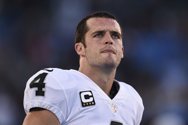 Oakland Raiders quarterback Derek Carr looks on during the second half of an NFL football game against the Los Angeles Chargers, Sunday, Dec. 31, 2017, in Carson, Calif. (AP Photo/Kelvin Kuo)