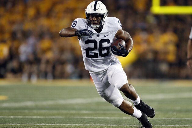 Penn State running back Saquon Barkley runs with the ball during the first half of an NCAA college football game against Iowa Saturday, Sept. 23, 2017, in Iowa City, Iowa. (AP Photo/Jeff Roberson)