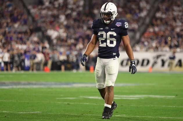 GLENDALE, AZ - DECEMBER 30:  Running back Saquon Barkley #26 of the Penn State Nittany Lions walks on the field during the second half of the Playstation Fiesta Bowl against the Washington Huskies at University of Phoenix Stadium on December 30, 2017 in Glendale, Arizona. The Nittany Lions defeated the Huskies 35-28.  (Photo by Christian Petersen/Getty Images)