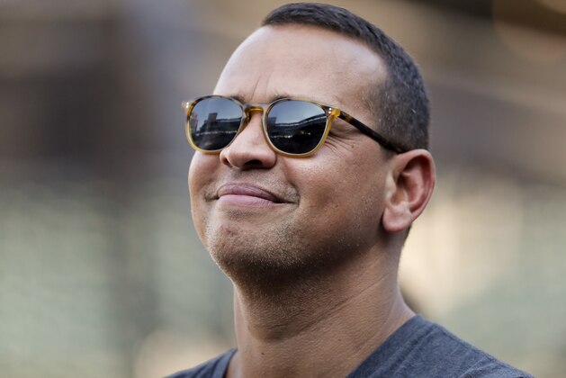 CORRECTS TO LOS ANGELES DODGERS, INSTEAD OF ANGELS - Former New York Yankees player Alex Rodriguez watches batting practice before a baseball game between the New York Mets and the Los Angeles Dodgers on Friday, Aug. 4, 2017, in New York. (AP Photo/Julie Jacobson)