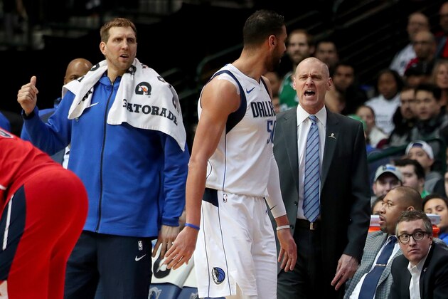 DALLAS, TX - JANUARY 22:  Head coach Rick Carlisle of the Dallas Mavericks and Salah Mejri #50 of the Dallas Mavericks react after Salah Mejri #50 of the Dallas Mavericks is ejected from the game against the Washington Wizards at American Airlines Center on January 22, 2018 in Dallas, Texas. NOTE TO USER: User expressly acknowledges and agrees that, by downloading and or using this photograph, User is consenting to the terms and conditions of the Getty Images License Agreement.  (Photo by Tom Pennington/Getty Images)