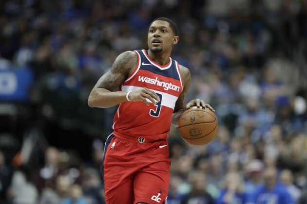 Washington Wizards' Bradley Beal (3) advances the ball against the Dallas Mavericks during an NBA basketball game, Monday, Jan. 22, 2018, in Dallas. (AP Photo/Tony Gutierrez)