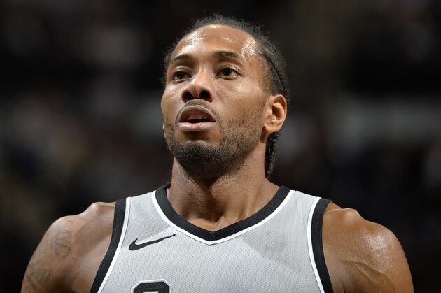 SAN ANTONIO, TX - JANUARY 13:  Kawhi Leonard #2 of the San Antonio Spurs looks on during the game against the Denver Nuggets on January 13, 2018 at the AT&T Center in San Antonio, Texas. NOTE TO USER: User expressly acknowledges and agrees that, by downloading and or using this photograph, user is consenting to the terms and conditions of the Getty Images License Agreement. Mandatory Copyright Notice: Copyright 2018 NBAE (Photos by Mark Sobhani/NBAE via Getty Images)
