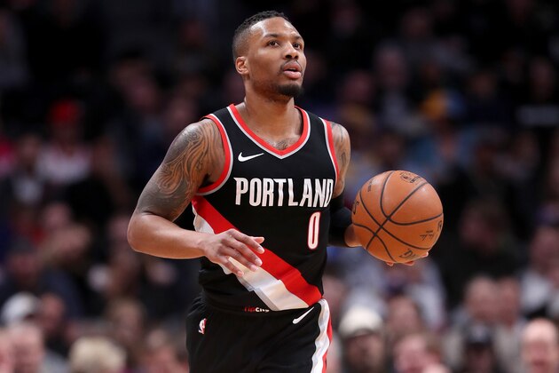 DENVER, CO - JANUARY 22:  Damian Lillard #0 of the Portland Trail Blazers brings the ball down the court against the Denver Nuggets at the Pepsi Center on January 22, 2018 in Denver, Colorado. NOTE TO USER: User expressly acknowledges and agrees that, by downloading and or using this photograph, User is consenting to the terms and conditions of the Getty Images License Agreement.  (Photo by Matthew Stockman/Getty Images)
