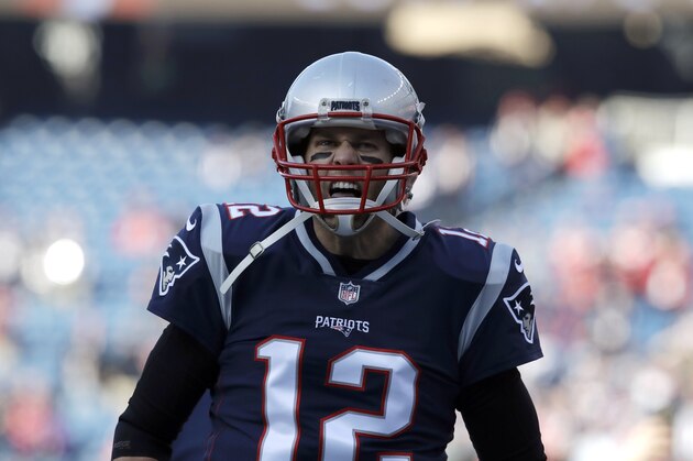 New England Patriots quarterback Tom Brady (12) warms up before the AFC championship NFL football game against the Jacksonville Jaguars, Sunday, Jan. 21, 2018, in Foxborough, Mass. (AP Photo/Charles Krupa)