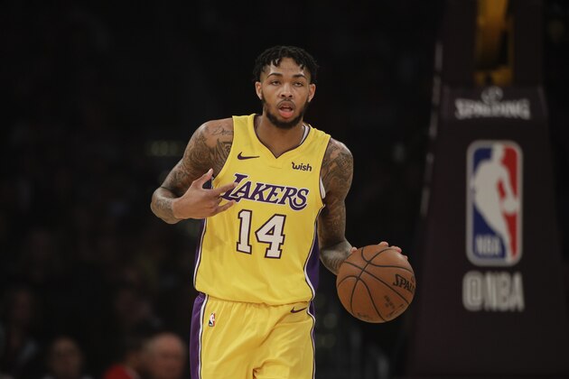 Los Angeles Lakers' Brandon Ingram dribbles the ball during the first half of an NBA basketball game against the San Antonio Spurs Thursday, Jan. 11, 2018, in Los Angeles. (AP Photo/Jae C. Hong)
