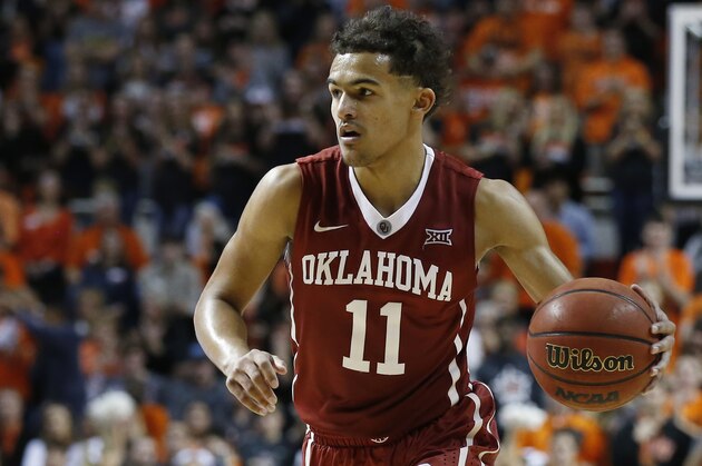 Oklahoma guard Trae Young (11) is pictured during an NCAA college basketball game against Oklahoma State in Stillwater, Okla., Saturday, Jan. 20, 2018. Oklahoma State won 83-81 in overtime. (AP Photo/Sue Ogrocki)