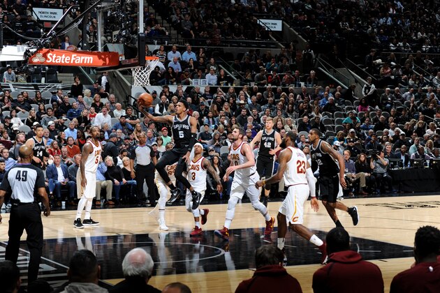 SAN ANTONIO, TX - JANUARY 23: Dejounte Murray #5 of the San Antonio Spurs shoots the ball during the game against the Cleveland Cavaliers on January 23, 2018 at the AT&T Center in San Antonio, Texas. NOTE TO USER: User expressly acknowledges and agrees that, by downloading and or using this photograph, user is consenting to the terms and conditions of the Getty Images License Agreement. Mandatory Copyright Notice: Copyright 2018 NBAE (Photos by Mark Sobhani/NBAE via Getty Images)