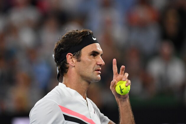 Switzerland's Roger Federer prepars to serve against Czech Republic's Tomas Berdych during their men's singles quarter-finals match on day 10 of the Australian Open tennis tournament in Melbourne on January 24, 2018. / AFP PHOTO / SAEED KHAN / -- IMAGE RESTRICTED TO EDITORIAL USE - STRICTLY NO COMMERCIAL USE -- (Photo credit should read SAEED KHAN/AFP/Getty Images) Switzerland's Roger Federer prepars to serve against Czech Republic's Tomas Berdych during their men's singles quarter-finals match on day 10 of the Australian Open tennis tournament in Melbourne on January 24, 2018. / AFP PHOTO / SAEED KHAN / -- IMAGE RESTRICTED TO EDITORIAL USE - STRICTLY NO COMMERCIAL USE -- (Photo credit should read SAEED KHAN/AFP/Getty Images)