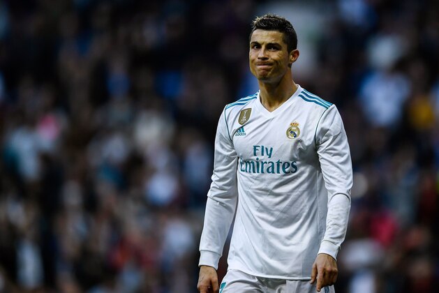 Real Madrid's Portuguese forward Cristiano Ronaldo reacts during the Spanish league football match between Real Madrid CF and RC Deportivo de la Coruna at the Santiago Bernabeu stadium in Madrid on January 21, 2018. / AFP PHOTO / OSCAR DEL POZO        (Photo credit should read OSCAR DEL POZO/AFP/Getty Images)