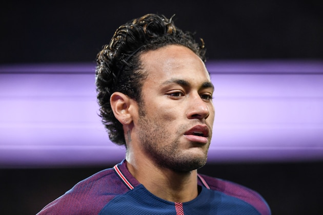 Paris Saint-Germain's Brazilian forward Neymar looks on during the French L1 football match between Paris Saint-Germain and Dijon on January 17, 2018 at the Parc des Princes stadium in Paris.  / AFP PHOTO / CHRISTOPHE SIMON        (Photo credit should read CHRISTOPHE SIMON/AFP/Getty Images)