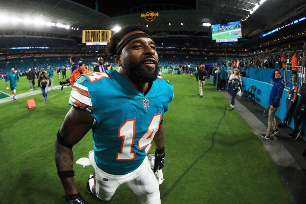 MIAMI GARDENS, FL - DECEMBER 11:  Jarvis Landry #14 of the Miami Dolphins celebrates their 27 to 20 win over the New England Patriots at Hard Rock Stadium on December 11, 2017 in Miami Gardens, Florida.  (Photo by Mike Ehrmann/Getty Images)