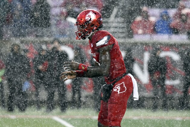 Louisville quarterback Lamar Jackson (8) during action of an NCAA college football game, Saturday, Nov. 18, 2017, in Louisville, Ky. (AP Photo/Timothy D. Easley)