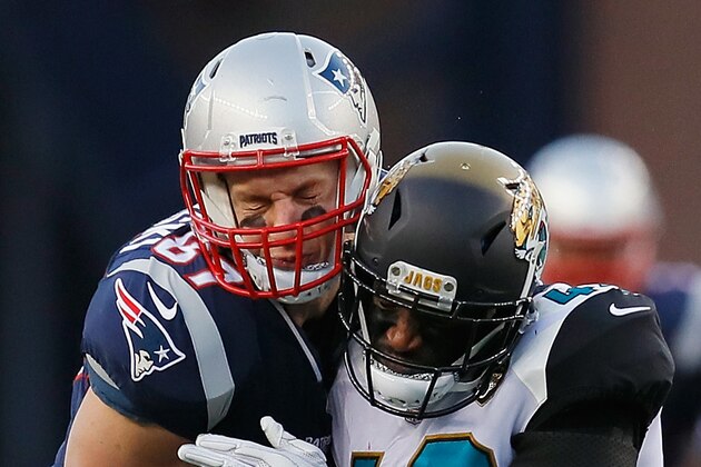 FOXBOROUGH, MA - JANUARY 21:  Rob Gronkowski #87 of the New England Patriots is hit by Barry Church #42 of the Jacksonville Jaguars in the second quarter during the AFC Championship Game at Gillette Stadium on January 21, 2018 in Foxborough, Massachusetts.  (Photo by Kevin C. Cox/Getty Images)