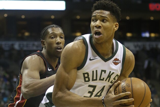 Milwaukee Bucks' Giannis Antetokounmpo looks to shoot against Miami Heat's Josh Richardson during an NBA basketball game Wednesday, Jan. 17, 2018, in Milwaukee. (AP Photo/Aaron Gash)