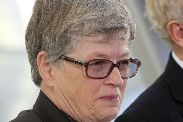 In this photo taken Nov. 9, 2012, Michigan State University President Lou Ann K. Simon smiles during the opening of the Broad Art Museum in East Lansing, Mich. Simon, the executive committee chairwoman of the NCAA, says the governing body deserves some of the criticism it has been peppered with lately while trying to run the
