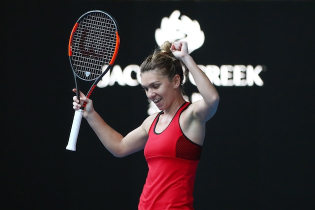 MELBOURNE, AUSTRALIA - JANUARY 25:  Simona Halep of Romania celebrates winning her semi-final match against Angelique Kerber of Germany on day 11 of the 2018 Australian Open at Melbourne Park on January 25, 2018 in Melbourne, Australia.  (Photo by Clive Brunskill/Getty Images)