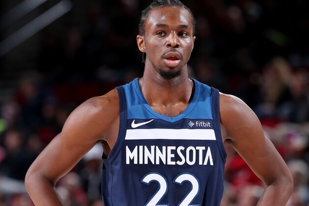 PORTLAND, OR - JANUARY 24: Andrew Wiggins #22 of the Minnesota Timberwolves looks on during the game against the Portland Trail Blazers on January 18, 2018 at the Moda Center in Portland, Oregon. NOTE TO USER: User expressly acknowledges and agrees that, by downloading and or using this Photograph, user is consenting to the terms and conditions of the Getty Images License Agreement. Mandatory Copyright Notice: Copyright 2018 NBAE (Photo by Sam Forencich/NBAE via Getty Images)