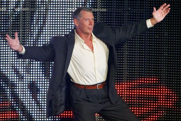 LAS VEGAS - AUGUST 24:  World Wrestling Entertainment Inc. Chairman Vince McMahon is introduced during the WWE Monday Night Raw show at the Thomas & Mack Center August 24, 2009 in Las Vegas, Nevada.  (Photo by Ethan Miller/Getty Images)