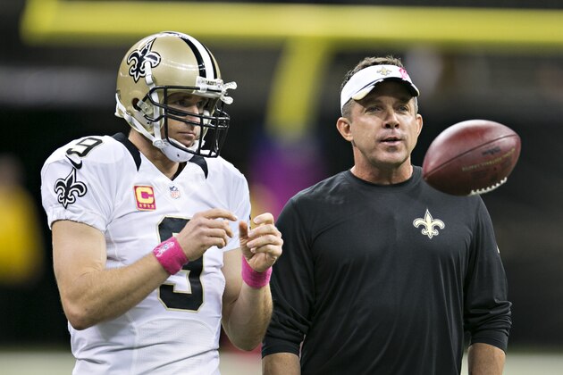 NEW ORLEANS, LA - OCTOBER 5:  Head Coach Sean Payton and Drew Brees #9 of the New Orleans Saints talk before a game against the Tampa Bay Buccaneers at Mercedes-Benz Superdome on October 5, 2014 in New Orleans, Louisiana.  The Saints defeated the Buccaneers 37-31.  (Photo by Wesley Hitt/Getty Images)