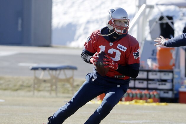 New England Patriots quarterback Tom Brady, front, performs field drills during an NFL football practice, Thursday, Jan. 25, 2018, in Foxborough, Mass. The Patriots are to play the Philadelphia Eagles in Super Bowl 52, Sunday, Feb. 4, in Minneapolis. (AP Photo/Steven Senne)