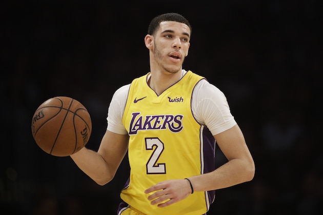 Los Angeles Lakers' Lonzo Ball dribbles the ball during the first half of an NBA basketball game against the San Antonio Spurs Thursday, Jan. 11, 2018, in Los Angeles. (AP Photo/Jae C. Hong)