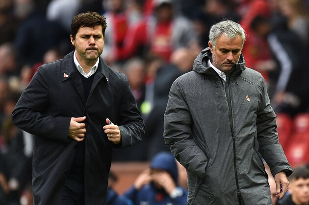 Tottenham Hotspur's Argentinian head coach Mauricio Pochettino (L) and Manchester United's Portuguese manager Jose Mourinho (R) walk off at half time in the English Premier League football match between Manchester United and Tottenham Hotspur at Old Trafford in Manchester, north west England, on October 28, 2017. / AFP PHOTO / Oli SCARFF / RESTRICTED TO EDITORIAL USE. No use with unauthorized audio, video, data, fixture lists, club/league logos or 'live' services. Online in-match use limited to 75 images, no video emulation. No use in betting, games or single club/league/player publications.  /         (Photo credit should read OLI SCARFF/AFP/Getty Images)