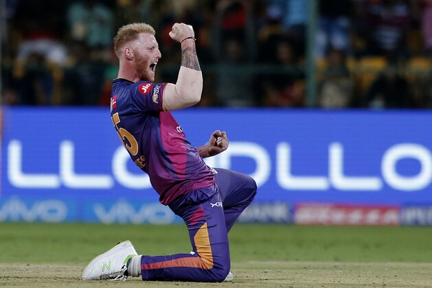 Rising Pune Supergiants bowler Ben Stokes celebrates the dismissal of Royal Challengers Bangalore batsman Shane Watson during their Indian Premier League (IPL) cricket match in Bangalore, India, Sunday, April 16, 2017. (AP Photo/Aijaz Rahi)