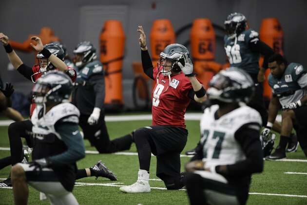 Philadelphia Eagles quarterback Nick Foles (9) stretches during practice at the team's NFL football training facility in Philadelphia, Thursday, Jan. 25, 2018. The Eagles face the New England Patriots in Super Bowl 52 on Sunday, Feb. 4, in Minneapolis. (AP Photo/Matt Rourke)