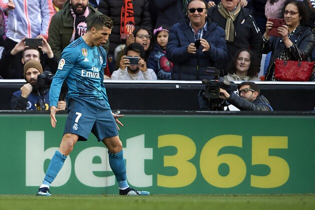 VALENCIA, SPAIN - JANUARY 27:  Cristiano Ronaldo of Real Madrid celebrates after scoring his sides first goal during the La Liga match between Valencia and Real Madrid at Estadio Mestalla on January 27, 2018 in Valencia, Spain.  (Photo by Quality Sport Images/Getty Images)