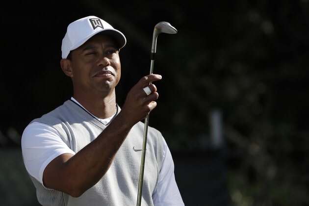 Tiger Woods waits to hit on the 11th hole of the South Course at Torrey Pines Golf Course during the third round of the Farmers Insurance Open golf tournament, Saturday, Jan. 27, 2018, in San Diego. (AP Photo/Gregory Bull)