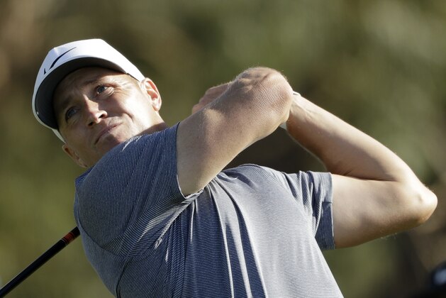 Alex Noren, of Sweden, watches his tee shot on the 14th hole of the South Course at Torrey Pines Golf Course during the third round of the Farmers Insurance Open golf tournament, Saturday, Jan. 27, 2018, in San Diego. (AP Photo/Gregory Bull)