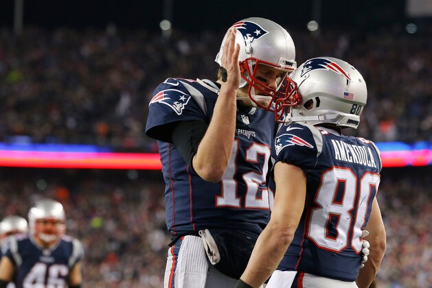 FOXBOROUGH, MA - JANUARY 21: Tom Brady #12 of the New England Patriots celebrates a touchdown with Danny Amendola #80 in the fourth quarter against the Jacksonville Jaguars during the AFC Championship Game at Gillette Stadium on January 21, 2018 in Foxborough, Massachusetts.  (Photo by Jim Rogash/Getty Images)