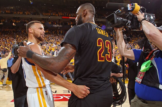 OAKLAND, CA - JUNE 12: Stephen Curry #30 of the Golden State Warriors and LeBron James #23 of the Cleveland Cavaliers talk after Game Five of the 2017 NBA Finals on June 12, 2017 at Oracle Arena in Oakland, California. NOTE TO USER: User expressly acknowledges and agrees that, by downloading and or using this photograph, user is consenting to the terms and conditions of Getty Images License Agreement. Mandatory Copyright Notice: Copyright 2017 NBAE (Photo by Nathaniel S. Butler/NBAE via Getty Images) OAKLAND, CA - JUNE 12: Stephen Curry #30 of the Golden State Warriors and LeBron James #23 of the Cleveland Cavaliers talk after Game Five of the 2017 NBA Finals on June 12, 2017 at Oracle Arena in Oakland, California. NOTE TO USER: User expressly acknowledges and agrees that, by downloading and or using this photograph, user is consenting to the terms and conditions of Getty Images License Agreement. Mandatory Copyright Notice: Copyright 2017 NBAE (Photo by Nathaniel S. Butler/NBAE via Getty Images)