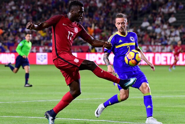 CARSON, CA - JANUARY 28:  CJ Sapong of The United States attempts a cross in front of Almir Bekic of Bosnia Herzegovina at StubHub Center on January 28, 2018 in Carson, California.  (Photo by Harry How/Getty Images)