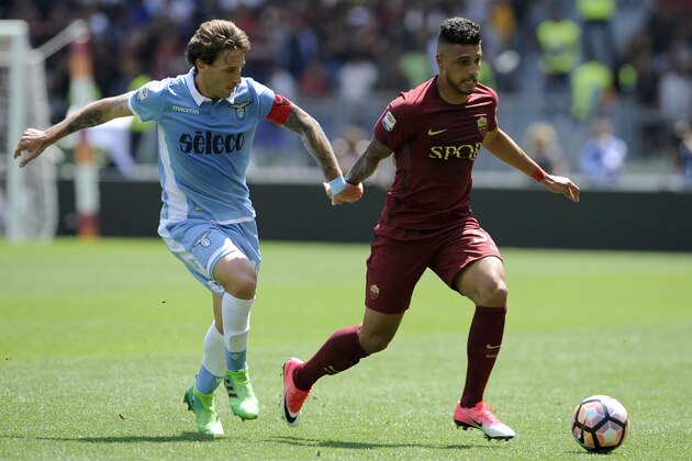 ROME, ROMA - APRIL 30:  Lucas Biglia of SS Lazio compete for the ball with Emerson Palmieri of AS Roma during the Serie A match between AS Roma and SS Lazio at Stadio Olimpico on April 30, 2017 in Rome, Italy.  (Photo by Marco Rosi/Getty Images)