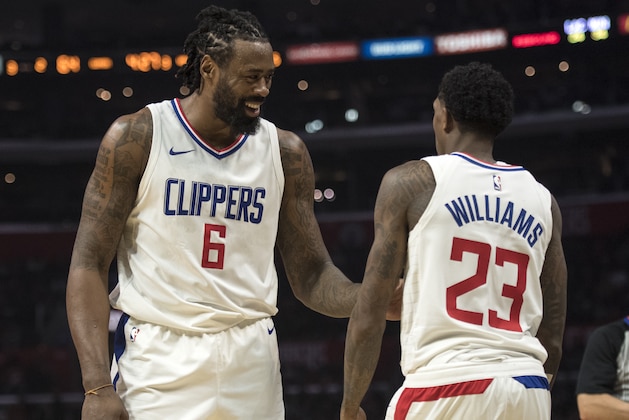 Los Angeles Clippers center DeAndre Jordan, left, and guard Lou Williams during the first half of an NBA basketball game Wednesday, Dec. 6, 2017, in Los Angeles. (AP Photo/Kyusung Gong)