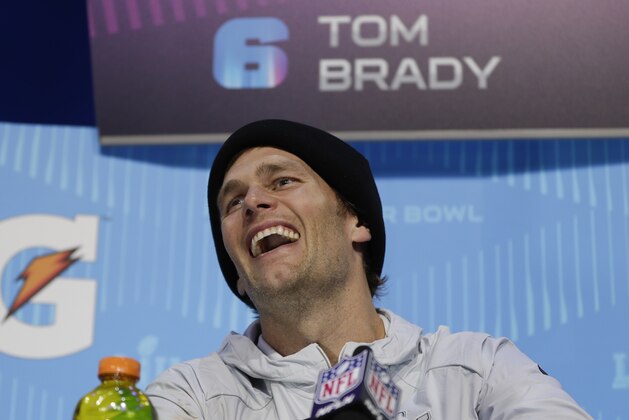 New England Patriots' Tom Brady laughs during NFL football Super Bowl 52 Opening Night Monday, Jan. 29, 2018, at the Xcel Center in St. Paul, Minn. (AP Photo/Matt Slocum)