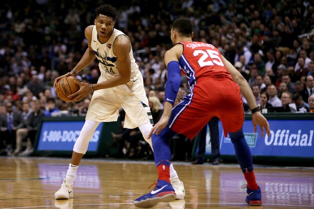 MILWAUKEE, WI - JANUARY 29: Giannis Antetokounmpo #34 of the Milwaukee Bucks handles the ball while being guarded by Ben Simmons #25 of the Philadelphia 76ers in the second quarter at the Bradley Center on January 29, 2018 in Milwaukee, Wisconsin. NOTE TO USER: User expressly acknowledges and agrees that, by downloading and or using this photograph, User is consenting to the terms and conditions of the Getty Images License Agreement. (Photo by Dylan Buell/Getty Images) MILWAUKEE, WI - JANUARY 29: Giannis Antetokounmpo #34 of the Milwaukee Bucks handles the ball while being guarded by Ben Simmons #25 of the Philadelphia 76ers in the second quarter at the Bradley Center on January 29, 2018 in Milwaukee, Wisconsin. NOTE TO USER: User expressly acknowledges and agrees that, by downloading and or using this photograph, User is consenting to the terms and conditions of the Getty Images License Agreement. (Photo by Dylan Buell/Getty Images)