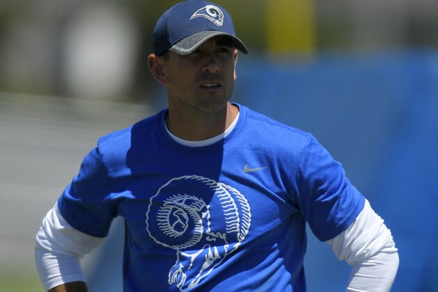 Los Angeles Rams offensive coordinator Matt LaFleur stands on the field during NFL football practice, Tuesday, June 13, 2017, in Thousand Oaks, Calif. (AP Photo/Mark J. Terrill)