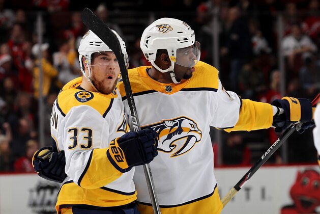 NEWARK, NJ - JANUARY 25:  Viktor Arvidsson #33 of the Nashville Predators celebrates his short handed goal with teammate P.K. Subban #76 in the third period against the New Jersey Devils on January 25, 2018 at Prudential Center in Newark, New Jersey.  (Photo by Elsa/Getty Images)