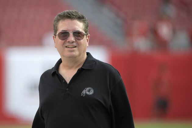 Washington Redskins owner Daniel Snyder watches warmups on the field before an NFL preseason football game against the Tampa Bay Buccaneers Thursday, Aug. 31, 2017, in Tampa, Fla. (AP Photo/Phelan M. Ebenhack)