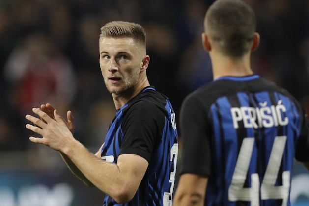 Inter Milan's Milan Skriniar reacts after scoring first goal for his side during an Italian Serie A soccer match between Inter Milan and Sampdoria, at the San Siro stadium in Milan, Italy, Tuesday, Oct. 24, 2017. (AP Photo/Luca Bruno)
