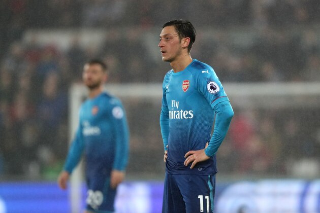 SWANSEA, WALES - JANUARY 30:  Mesut Ozil of Arsenal looks on during the Premier League match between Swansea City and Arsenal at Liberty Stadium on January 30, 2018 in Swansea, Wales.  (Photo by Matthew Ashton - AMA/Getty Images)