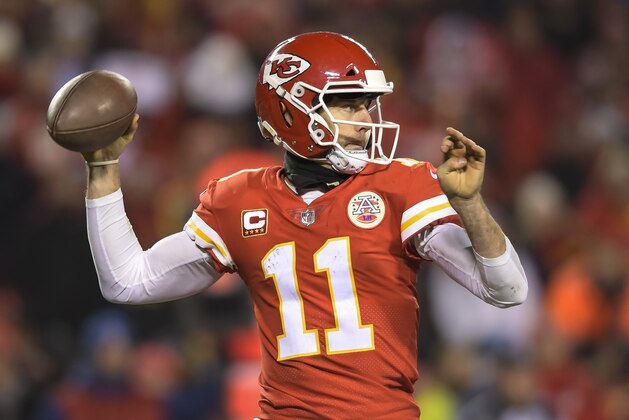 Kansas City Chiefs quarterback Alex Smith (11) throws against the Tennessee Titans during the second half of an NFL wild-card playoff game in Kansas City, Mo., Saturday, Jan. 6, 2018. (AP Photo/Reed Hoffmann)