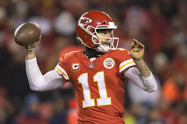Kansas City Chiefs quarterback Alex Smith (11) throws against the Tennessee Titans during the second half of an NFL wild-card playoff game in Kansas City, Mo., Saturday, Jan. 6, 2018. (AP Photo/Reed Hoffmann)